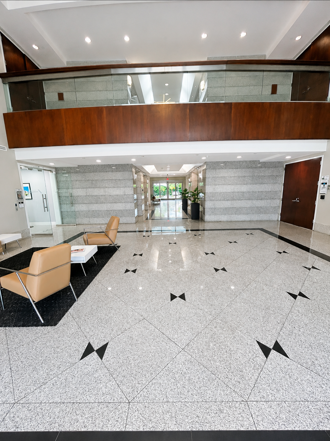 Waterford Centre polished lobby with wood and stone finishes